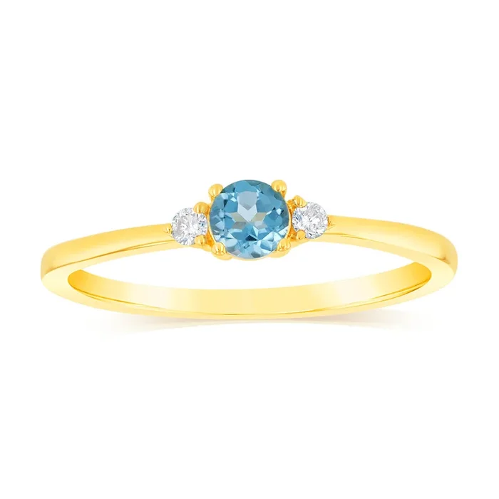 0.30 Carat Blue Topaz and Diamond Ring in 9ct Yellow Gold