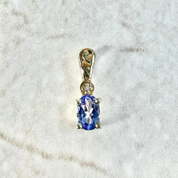 10 Karat Yellow Gold Oval Tanzanite & Diamond Solitaire Pendant
