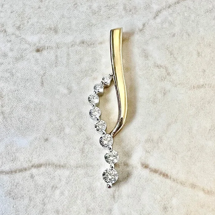 14 Karat Two-Tone Gold 1/2 Carat Graduated Diamond Pendant