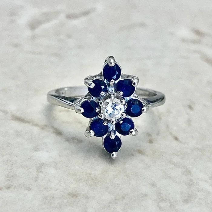 14 Karat White Gold Diamond & Blue Sapphire Halo Navette Ring