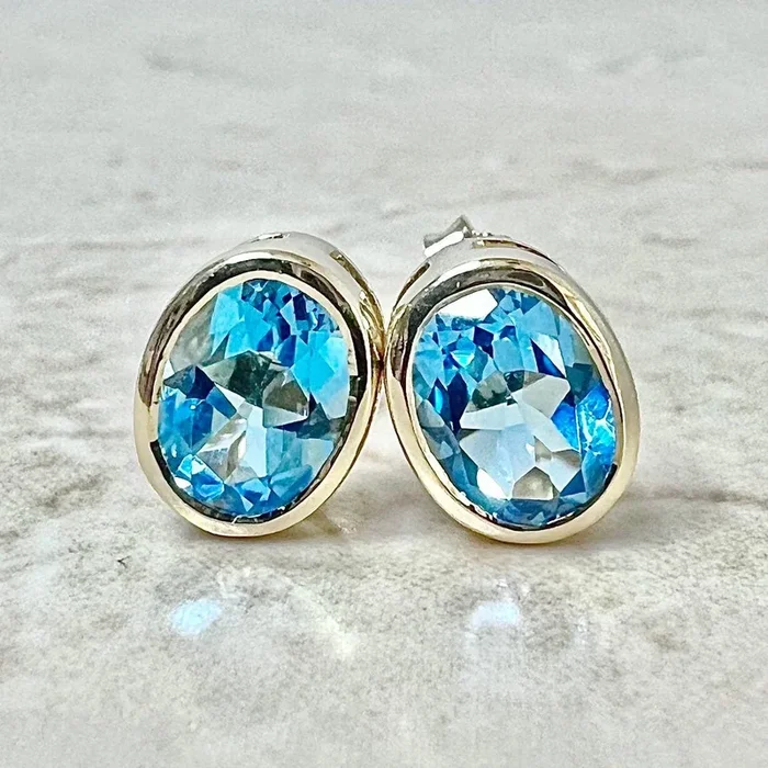 14 Karat Yellow Gold Bezel Swiss Blue Topaz Stud Earrings