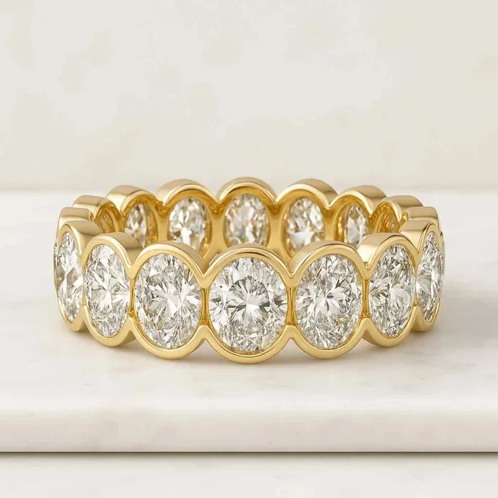 14k Gold Half Bezel Setting Oval Cut Diamond Band