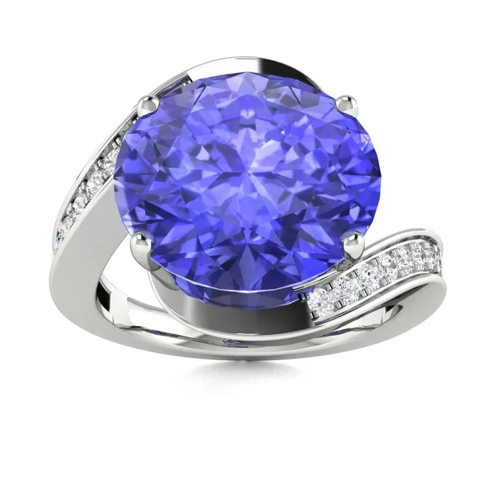 14KT Gold Oval Tanzanite and Diamond Ring (Tanzanite 3.25 cts. White Diamond 0.33 cts.)