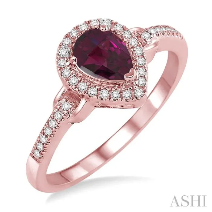 7×5 MM Pear Shape Rhodolite Garnet and 1/6 Ctw Round Cut Diamond Ring in 10K Rose Gold