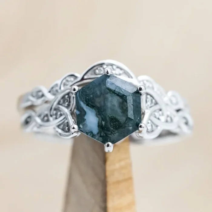 “AIFE” – CELTIC KNOT ACCENTED HEXAGON CUT MOSS AGATE ENGAGEMENT RING WITH GREEN TOURMALINE & A DIAMOND TRACER