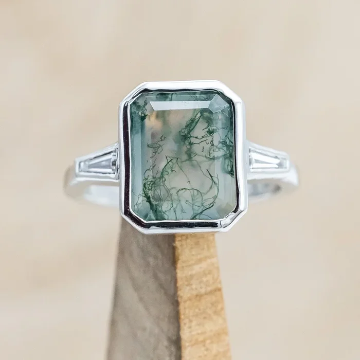 “ALYS” – EMERALD CUT MOSS AGATE ENGAGEMENT RING WITH DIAMOND ACCENTS