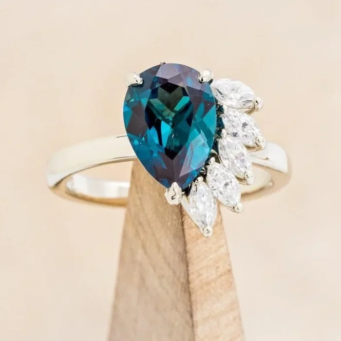 “AMBROSIA” – PEAR CUT LAB-GROWN ALEXANDRITE ENGAGEMENT RING WITH DIAMOND ACCENTS