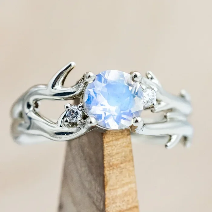 “ARTEMIS” – ROUND CUT MOONSTONE ENGAGEMENT RING WITH ANTLER-STYLE BAND & DIAMOND ACCENTS