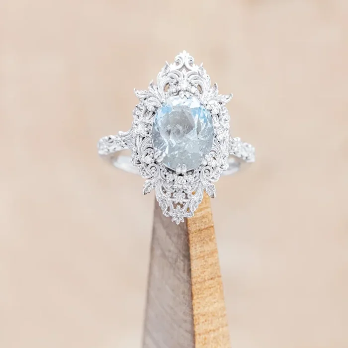 “CHERIE” – ROCOCO-STYLE OVAL CUT AQUAMARINE ENGAGEMENT RING WITH DIAMOND ACCENTS