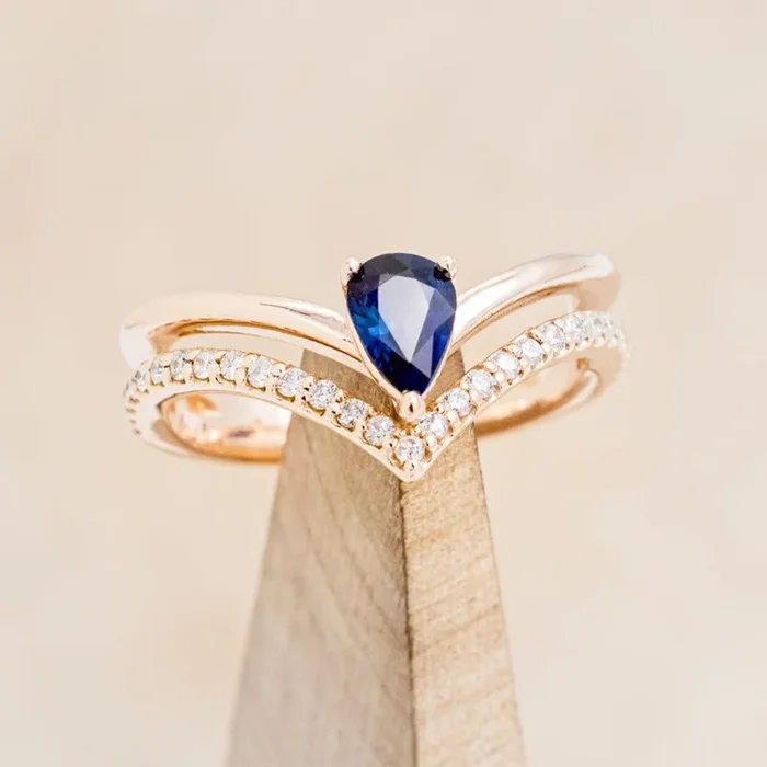 “CICELY” – PEAR CUT LAB-GROWN BLUE SAPPHIRE ENGAGEMENT RING WITH DIAMOND ACCENTS