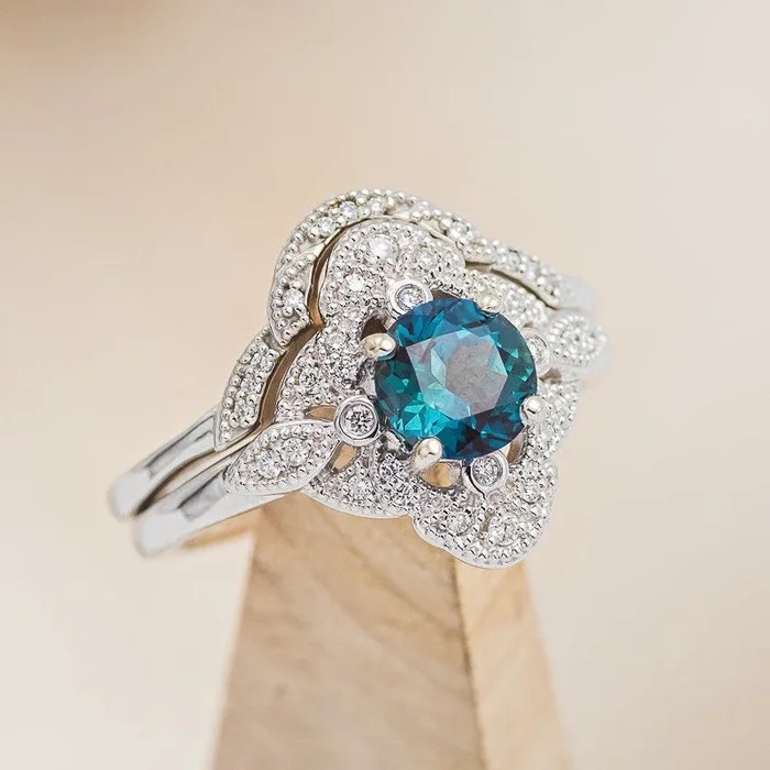 “FLORENCE” – ROUND CUT ENGAGEMENT RING WITH DIAMOND ACCENTS