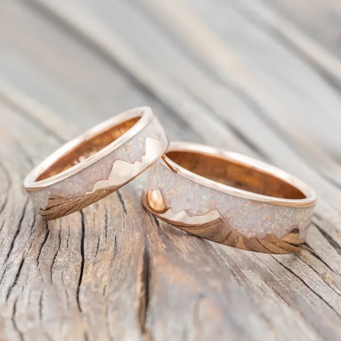 “HELIOS” – MATCHING SET OF FIRE & ICE OPAL INLAY MOUNTAIN RANGE WEDDING BANDS