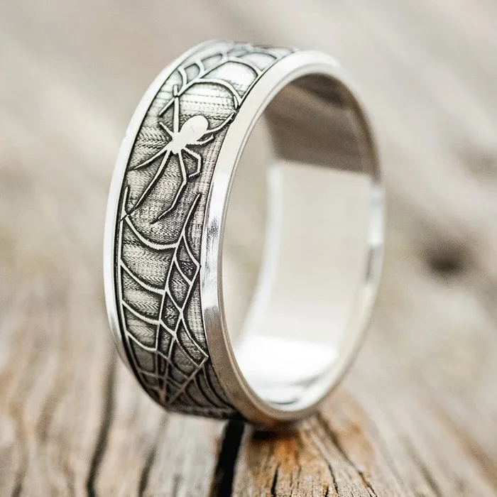 “LEGACY” – CHANNEL EMBOSSED SPIDER & WEB WEDDING BAND