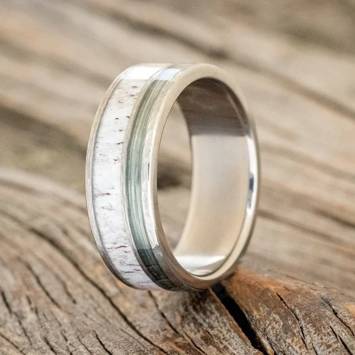 “RAPTOR” – ANTLER & FISHING LINE WEDDING RING FEATURING A HAMMERED BAND