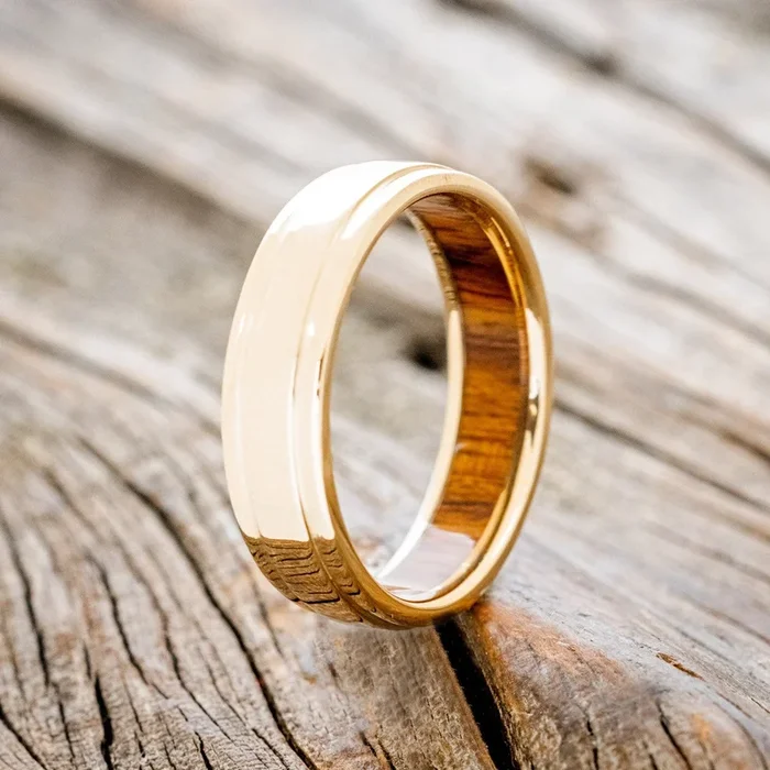 “SEDONA” – RAISED CENTER WEDDING RING FEATURING AN IRONWOOD LINING