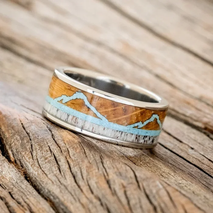 “THE EXPEDITION” – MOUNTAIN ENGRAVED WEDDING RING WITH WHISKEY BARREL OAK, TURQUOISE & ANTLER