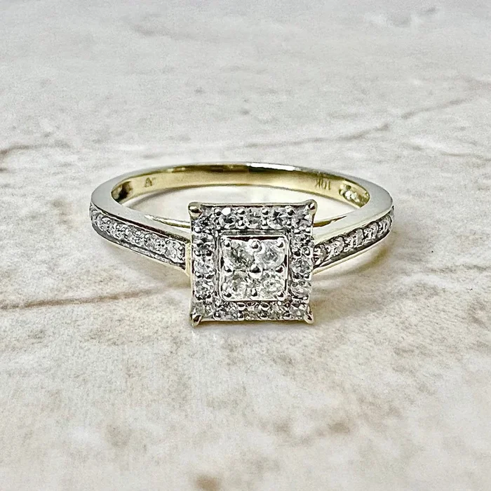 Anillo de oro amarillo de 10 quilates con halo de diamantes pavé de 1/4 quilate