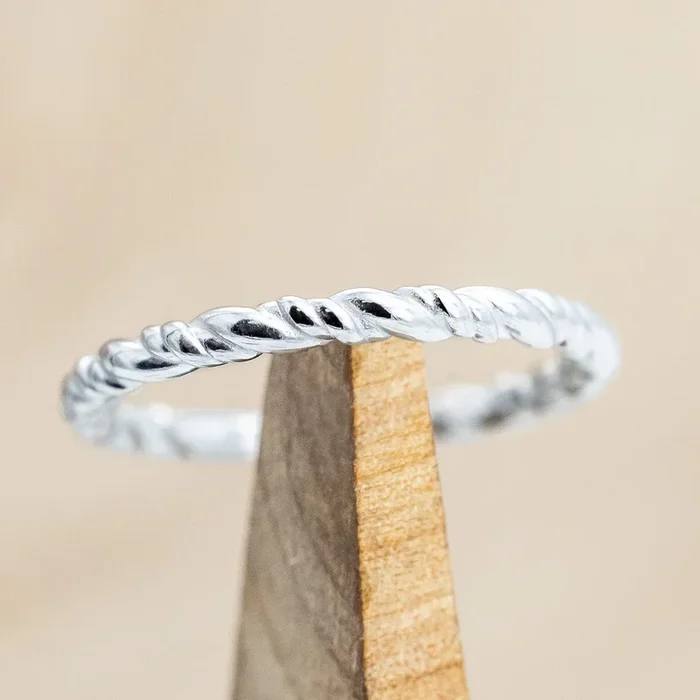 ANNIVERSARY BAND WITH A TWISTED SHANK DESIGN