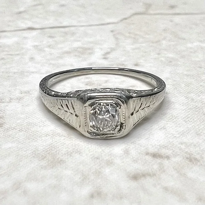Antique Art Deco 14 Karat White Gold Filigree 0.18 Carat Diamond Engagement Ring