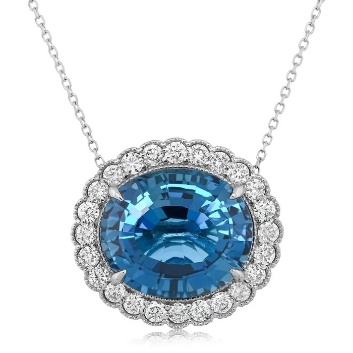 Blue Oval Topaz & Diamond Halo Pendant
