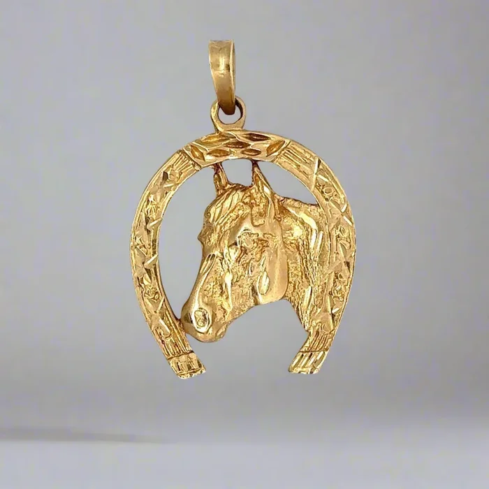Colgante de herradura unisex de oro amarillo de 14 quilates