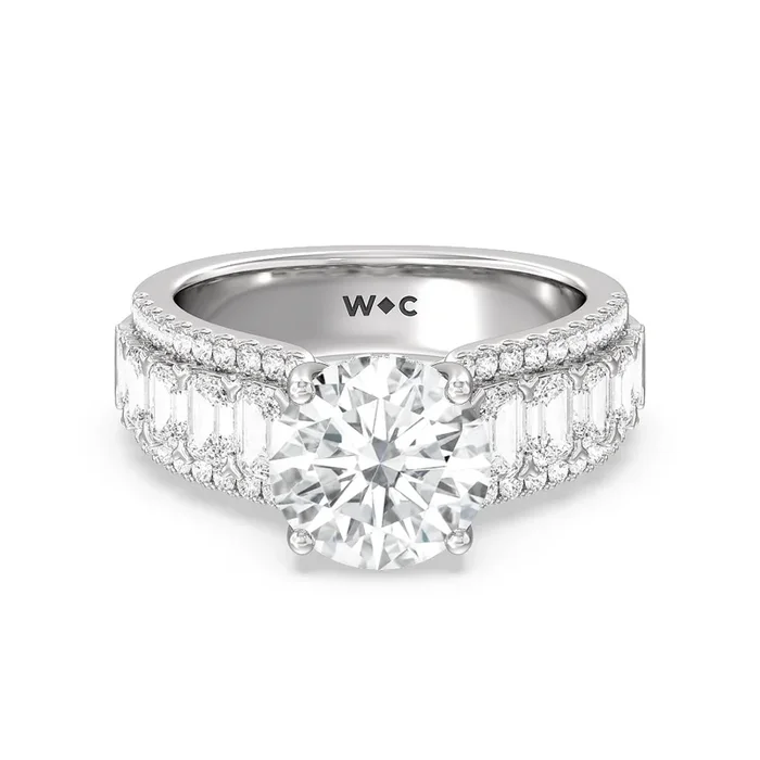 Emerald Side Stone Broad Band Hidden Halo Engagement Ring