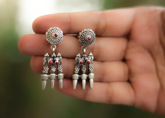 Essence Ruby Studded Trishul Earrring