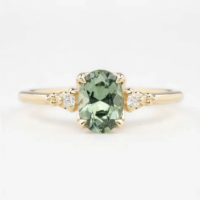 Estel Ring 1.28ct Light Blue Green Oval Montana Sapphire, 14K Yellow Gold (One of a kind)