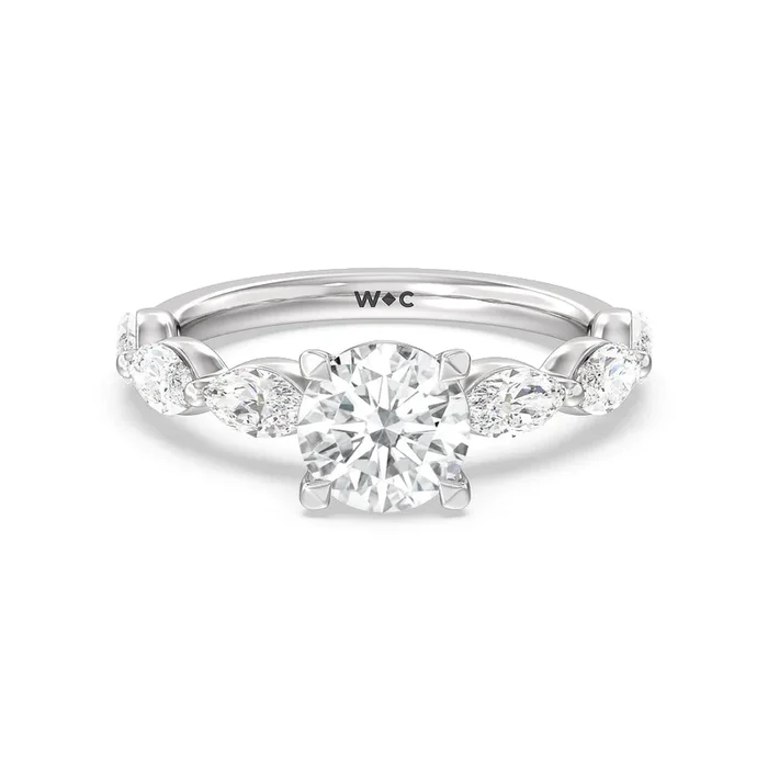Glamorous Marquise Side Stone Engagement Ring