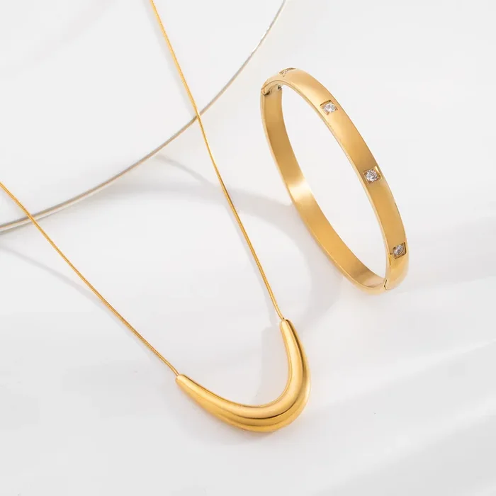 Golden Boomerang Necklace & Dazzling Stone Bangle Bracelet Combo Set