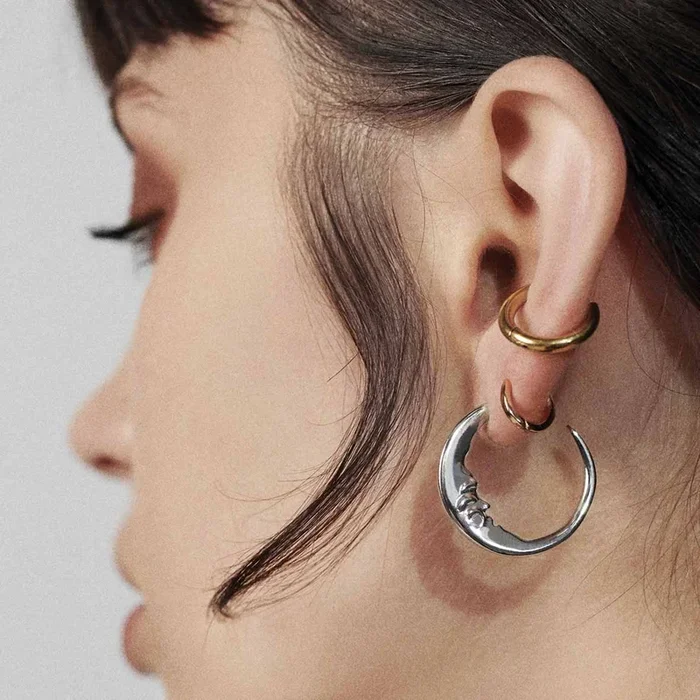 GOOD NIGHT. Man in the Moon Crescent Earrings – Silver