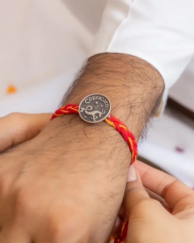 Moh Capricorn Sun Sign Brooch Cum Rakhi