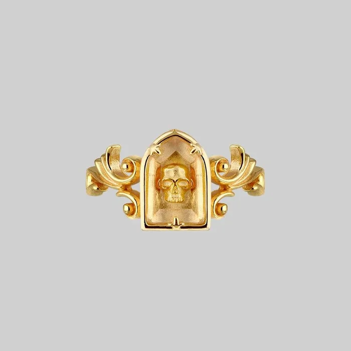 OMINOUS. Skull Under Glass Ring – Gold