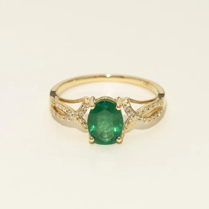 Oval Emerald Ring in 14kt Yellow Gold with Diamonds (1/7ct tw)