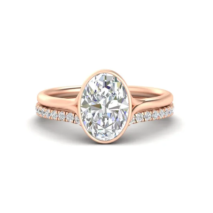 Oval Shaped Bezel Solitaire Ring With Diamond Band