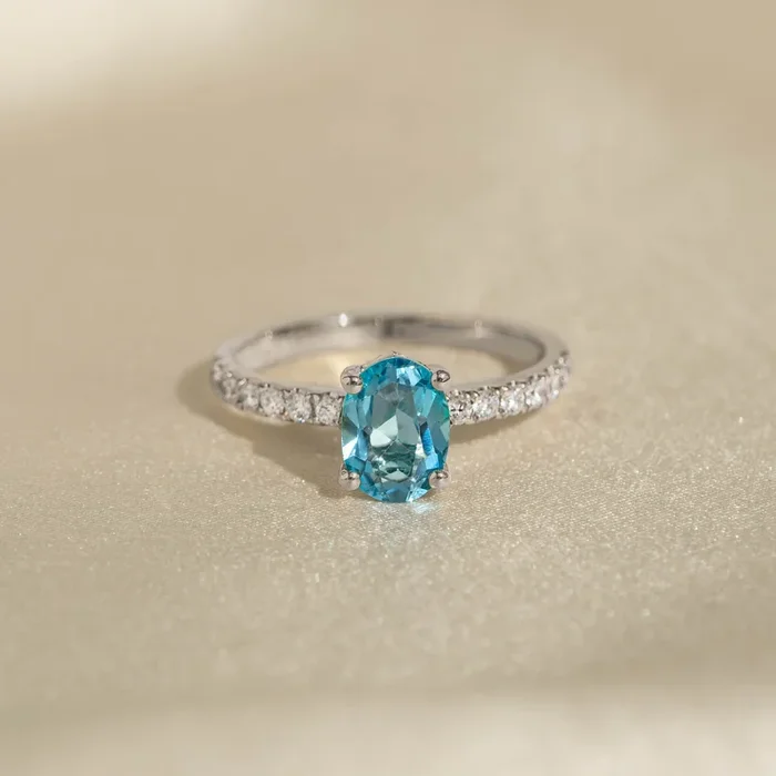 Oval Swiss Blue Topaz and Diamond Ring White Gold – Minette
