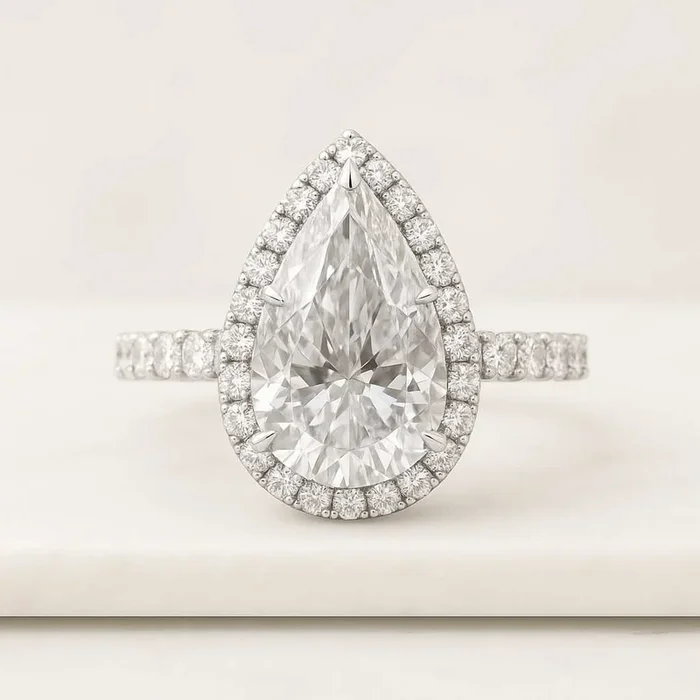 Pear Cut Moissanite Halo Engagement Ring with Pavé Set in 10k Gold