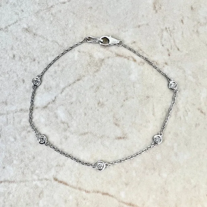 Pulsera de oro blanco de 14 quilates con diamantes de 0,35 quilates por yarda