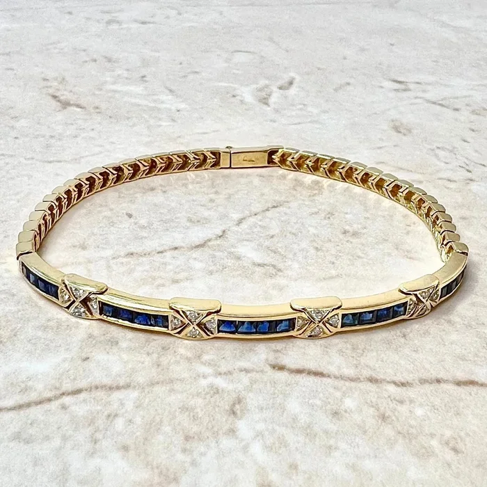 Pulsera vintage de oro amarillo de 18 quilates con zafiros y diamantes