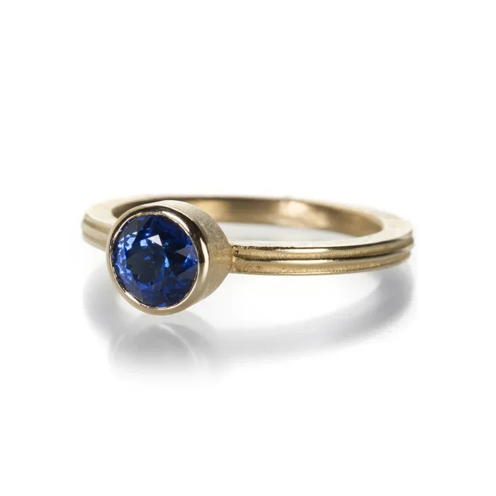 Round Blue Sapphire on Fluted Band