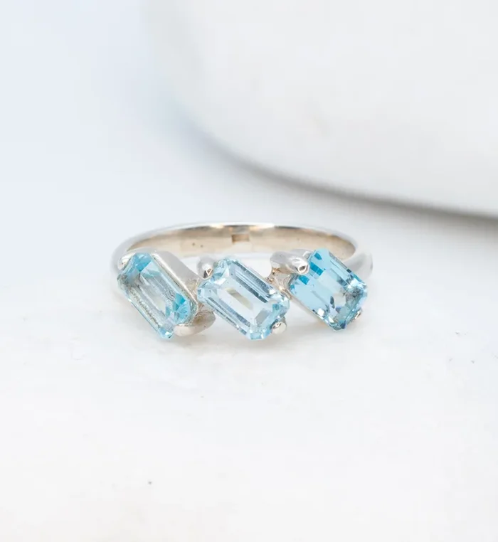 Slanted Baguette Blue Topaz Trilogy Ring in Silver