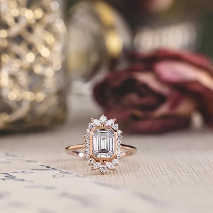 The Hazel – Emerald-Cut Bezel Engagement Ring with Diamond Halo