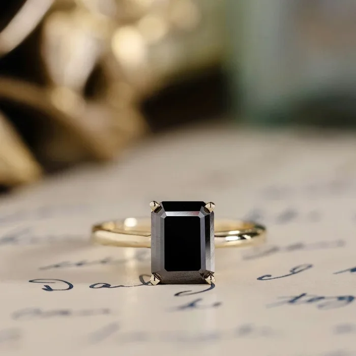 The Raven – Emerald-Cut Onyx Solitaire Engagement Ring with Vintage-Inspired Setting