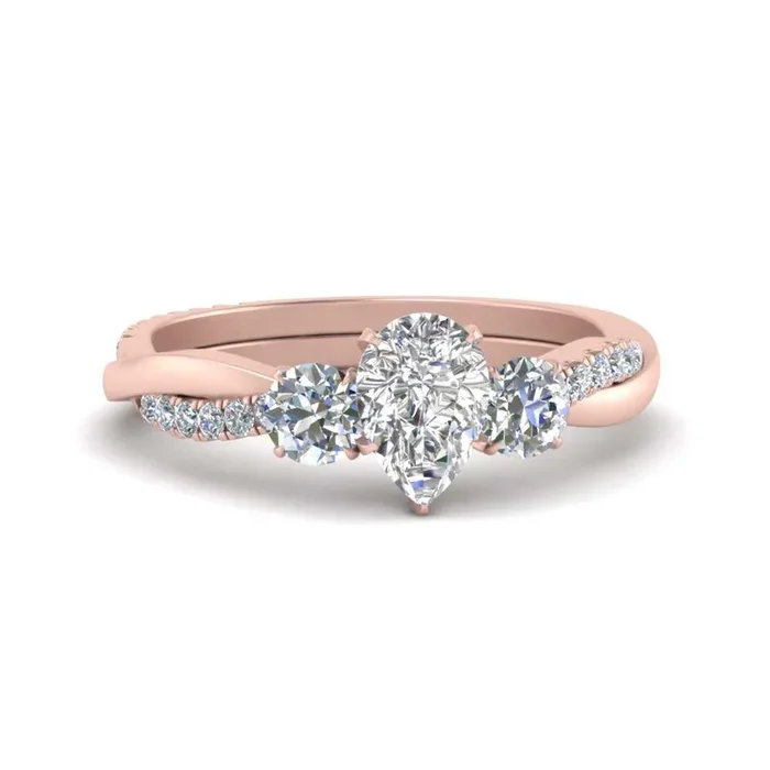 Three Stone Pear Shaped Twisted Vine Diamond Ring
