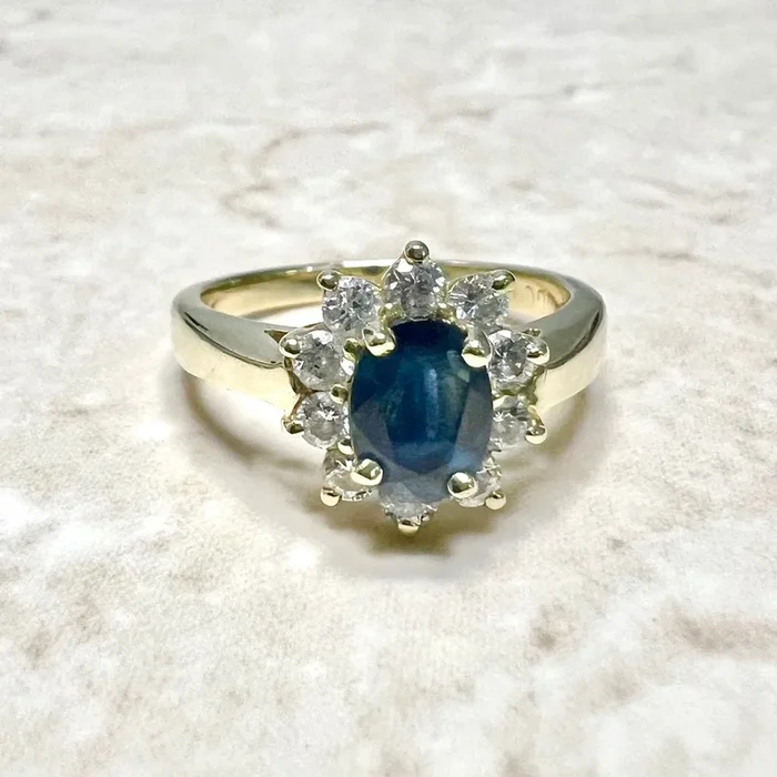 Vintage 14 Karat Yellow Gold Diamond & Natural Sapphire Halo Ring