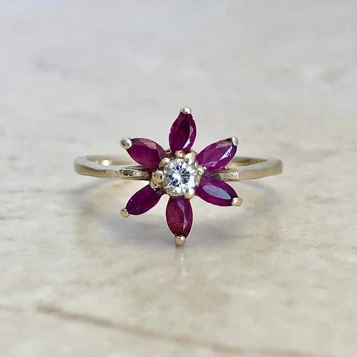 Vintage 14 Karat Yellow Gold Natural Ruby & Diamond Flower Halo Ring