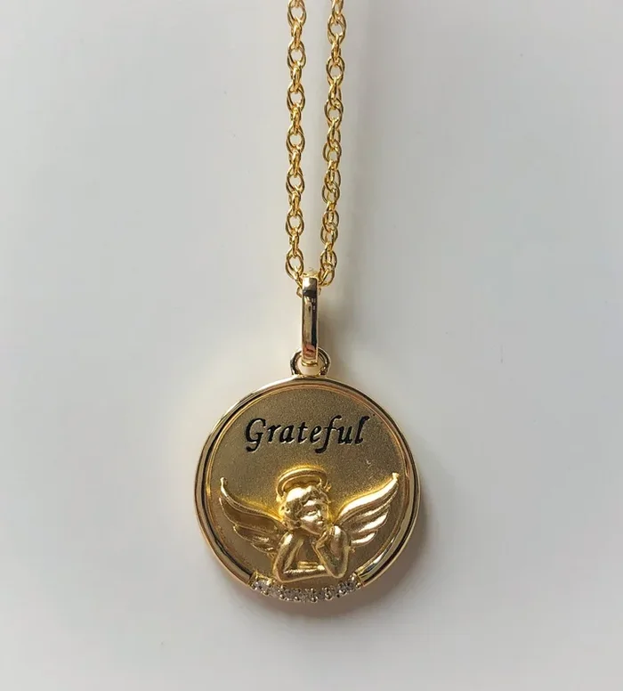 Yellow Gold over Sterling angel Pendant with diamond accent